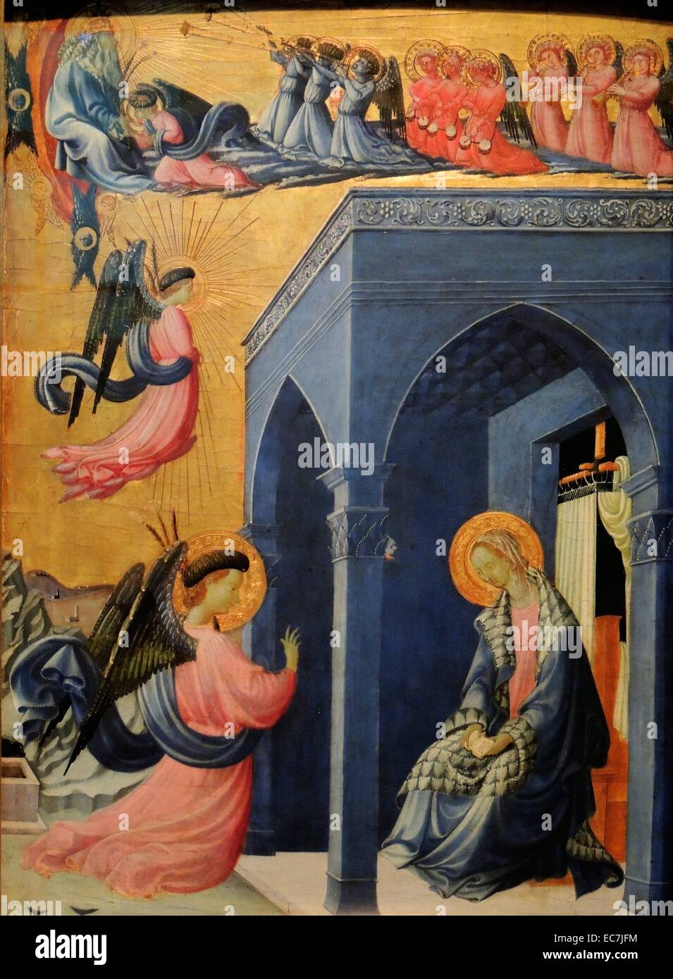 Attributed to Paolo di Dono, called Uccello (1397 -1475). The Annunciation, tempera and gilding on panel.  The Archangel Gabriel was commanded by God to announce to the Virgin Mary that she would give birth to the Saviour.  The imagery recalls that of ornate illuminated manuscripts.  With lavish use of gold and ultramarine blue, this devotional image would have been very expensive to produce. Dated 15th Century Stock Photo