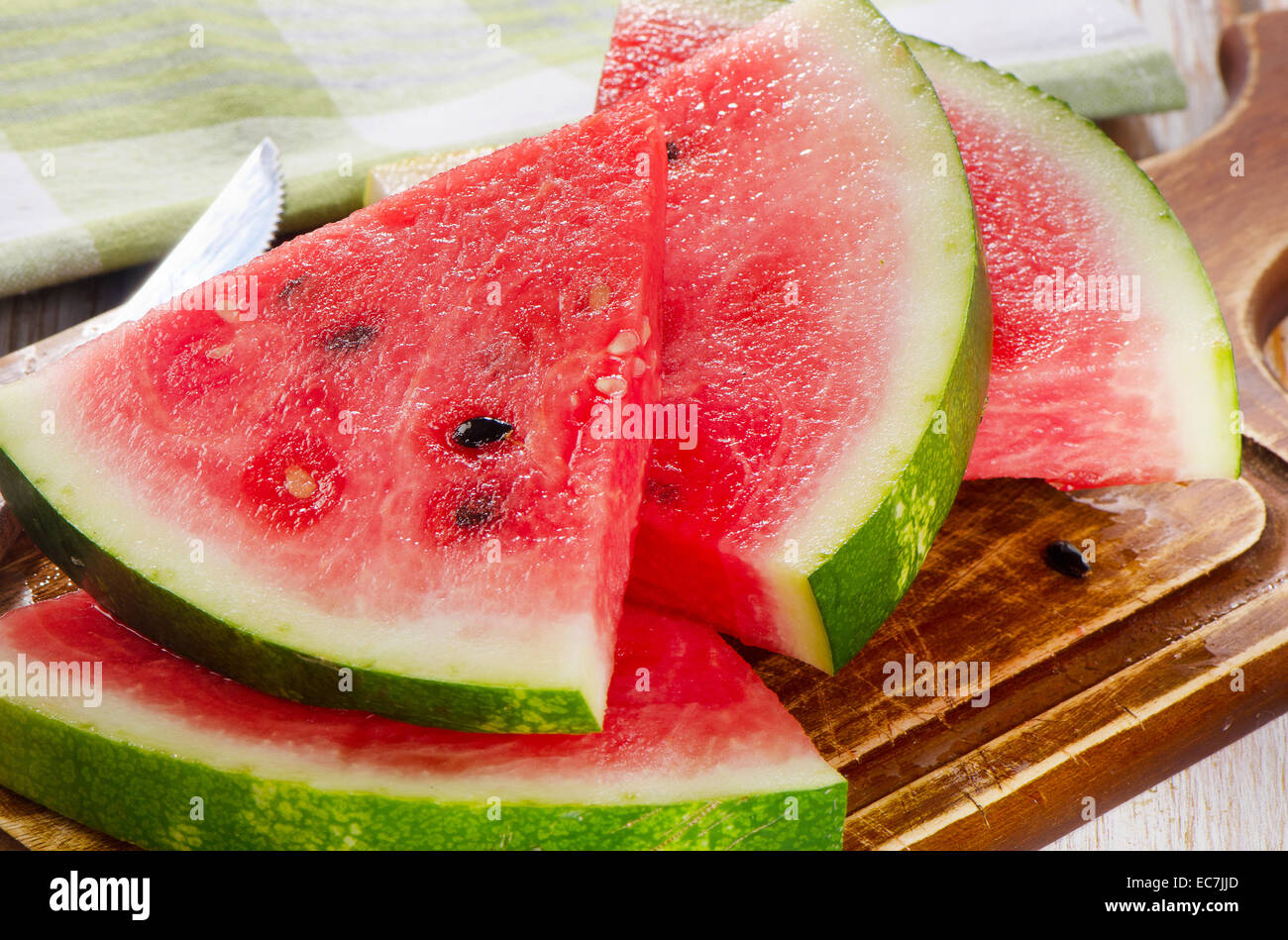 slices of watermelon on wooden table. selective focus Stock Photo