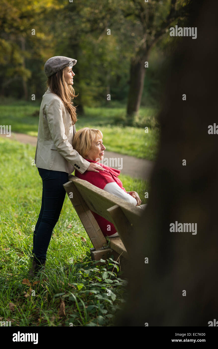 Senior woman and granddaughter together in a park Stock Photo