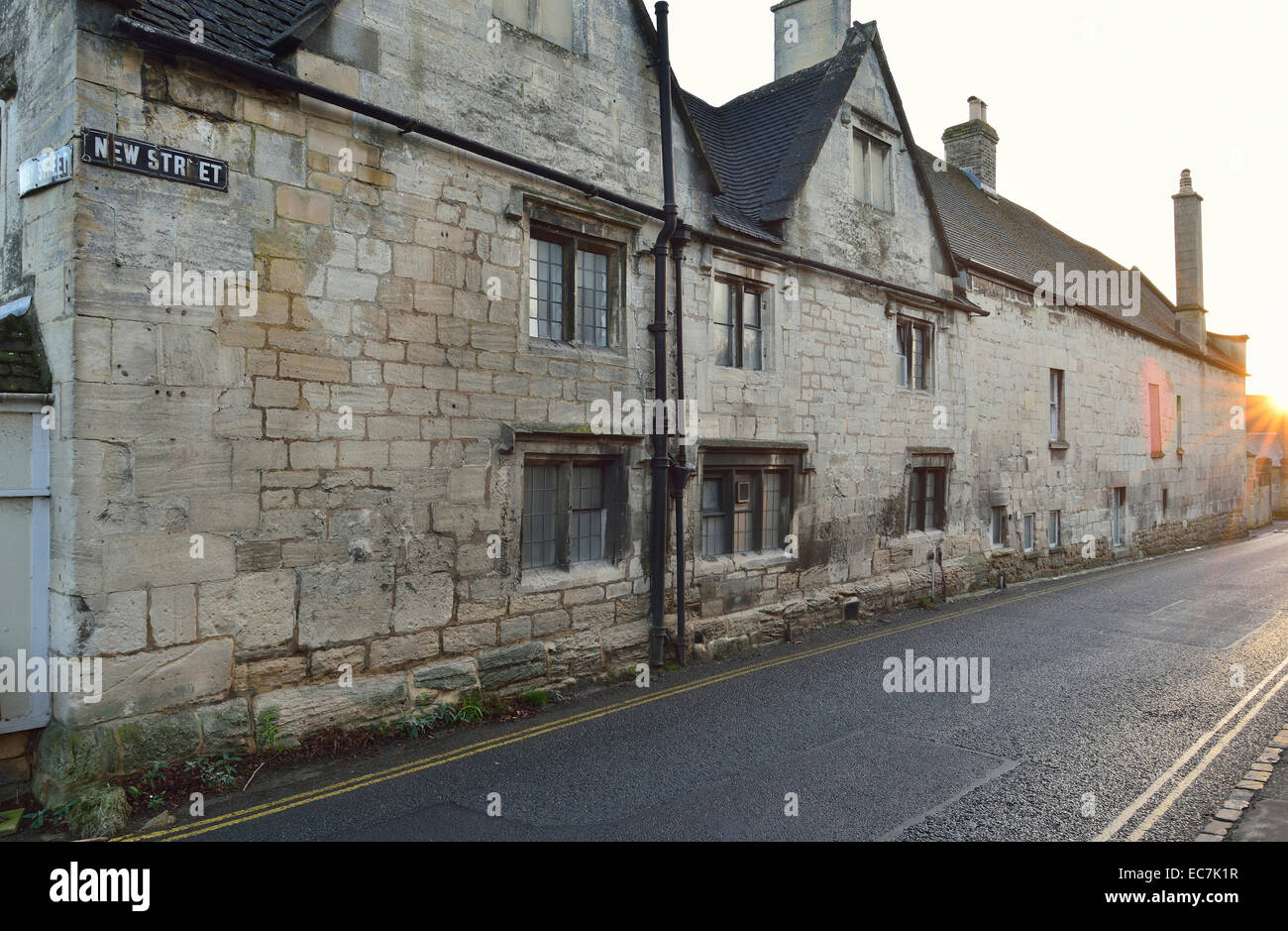 Sunset on New Street, Painswick Old Cotstold Stone Buildings Stock Photo