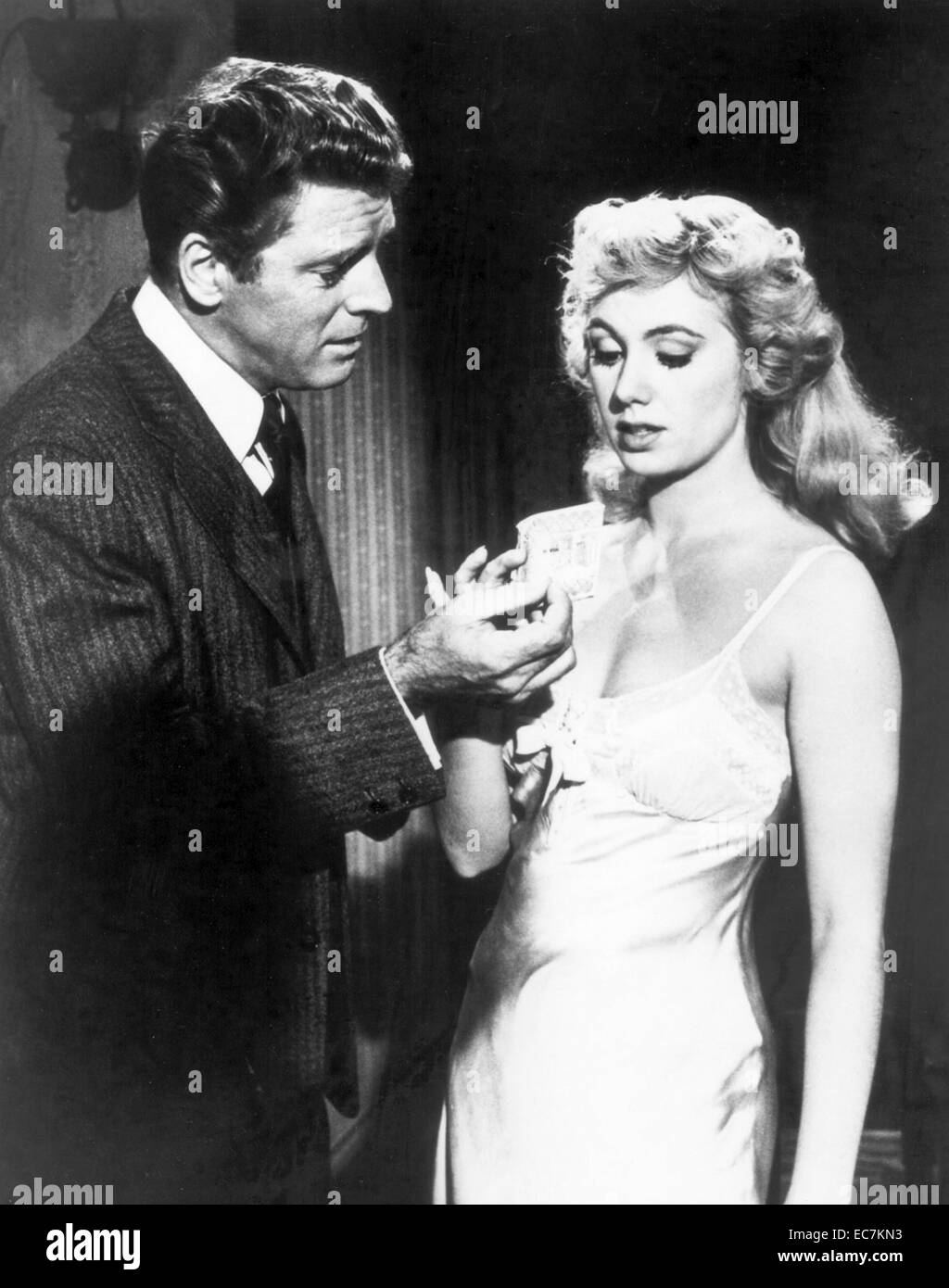 Elmer Gantry is a 1960 drama film about a con man and a female evangelist selling religion to small town America. Adapted by director Richard Brooks, the film is based on the 1927 novel of the same name by Sinclair Lewis and stars Burt Lancaster, Jean Simmons, Arthur Kennedy and Shirley Jones Stock Photo