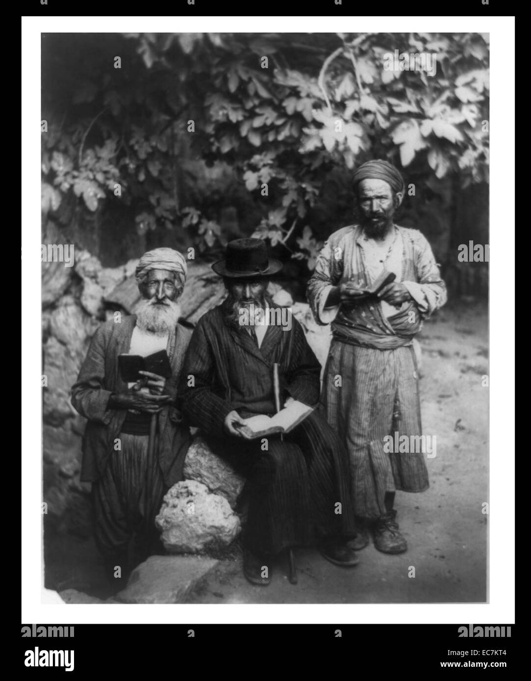 Three elderly men holding books - a group of old Jews in an American Colony, Jerusalem. Stock Photo