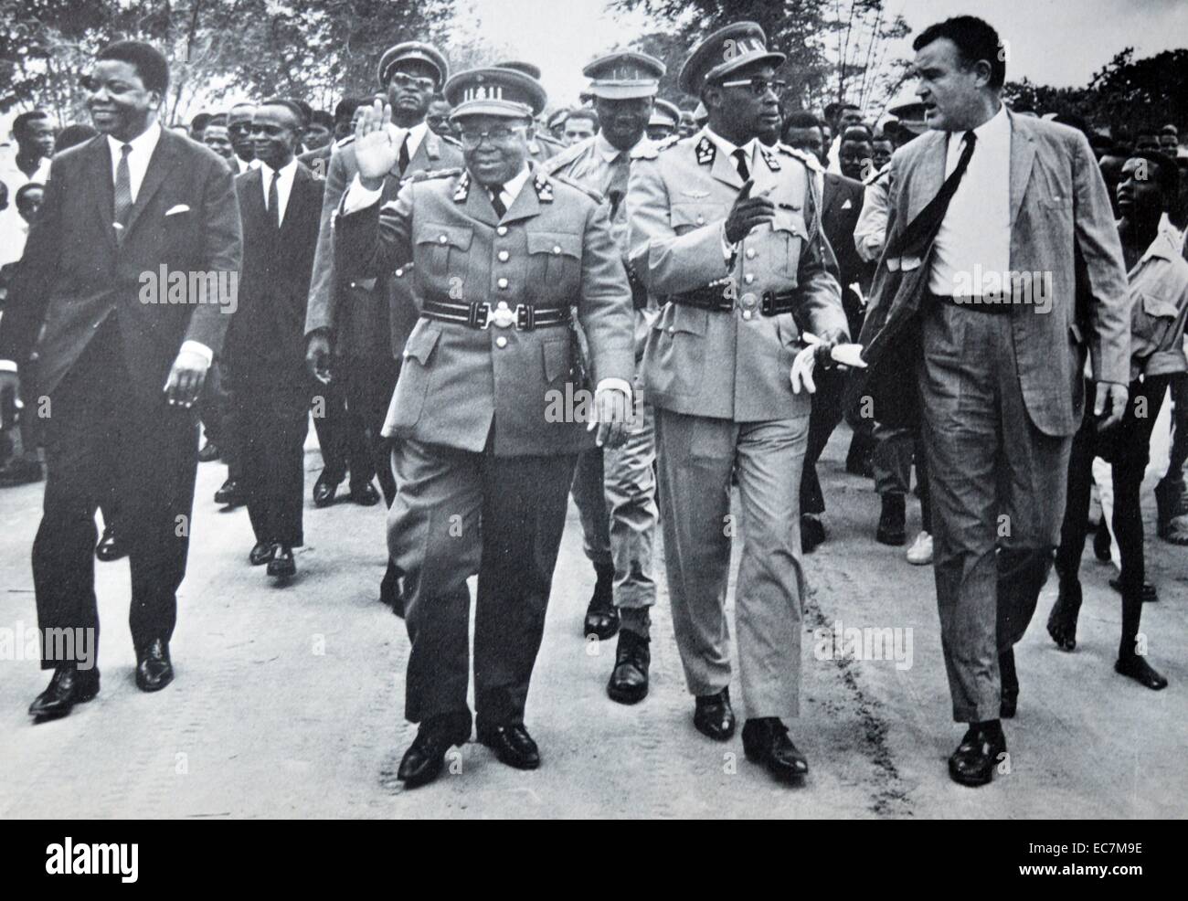 Coalition formed to govern the Congo 1963. Leaders march through the capital to show unity.Moise tshombe (left), Joseph Kasavubu (centre) and Joseph Mobutu (2nd from right). Stock Photo