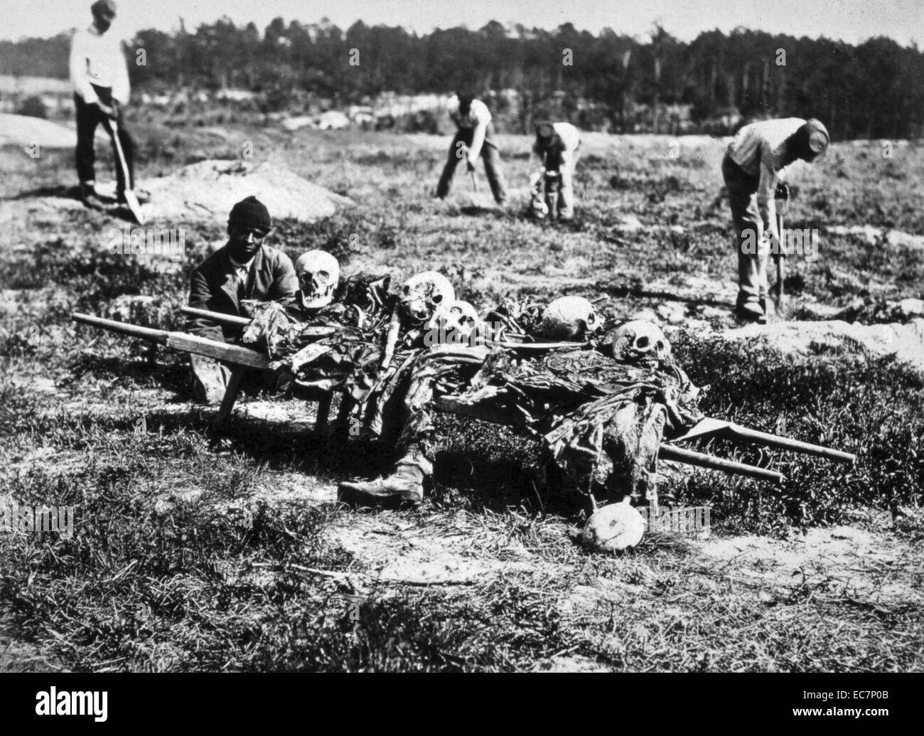 Photograph of an African American collecting the bones of soldiers killed during the Battle of Cold Harbour, Virginia. Dated 1865 Stock Photo