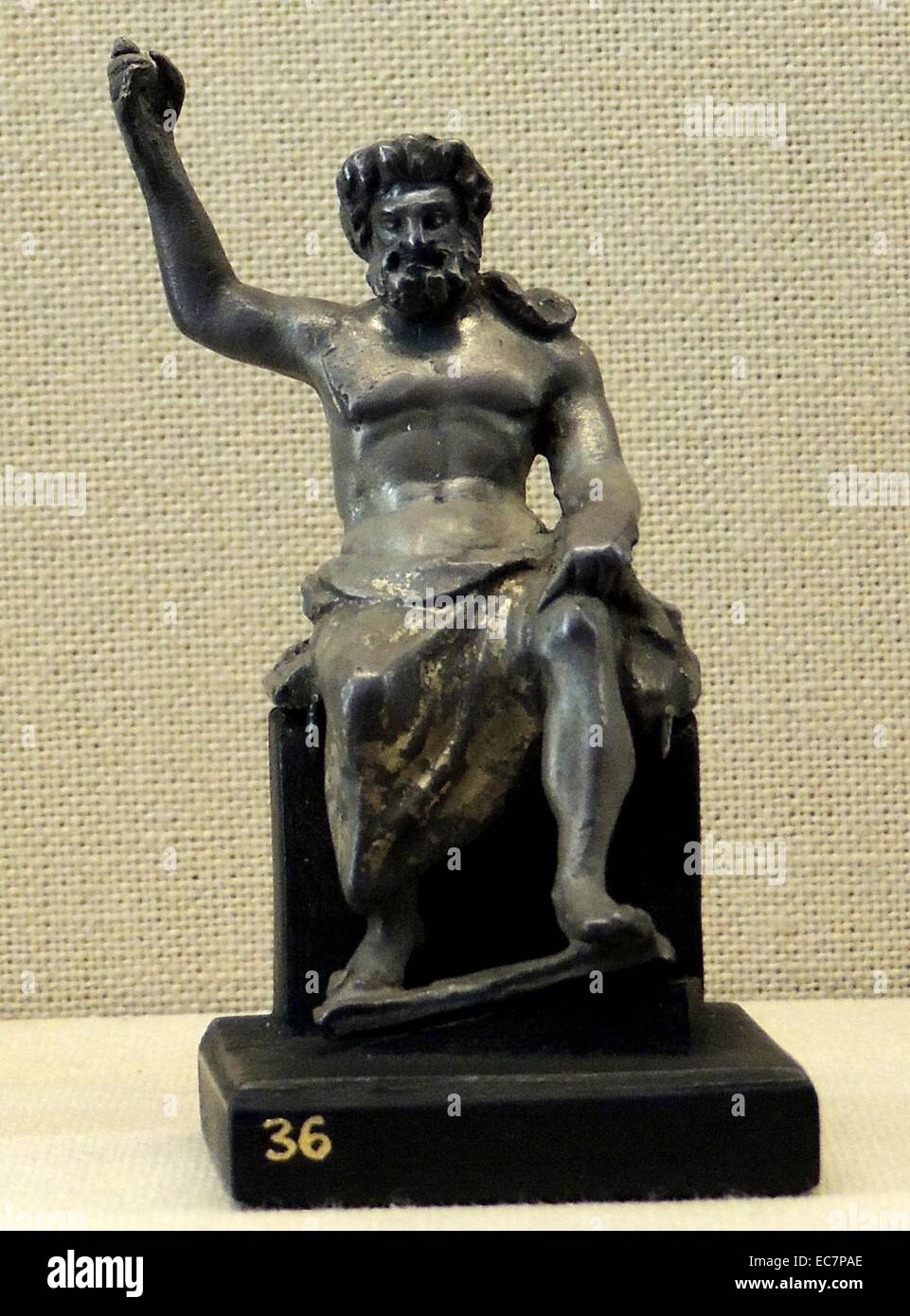 Zeus, patron of the Olympic Games. These figures, two made of silver