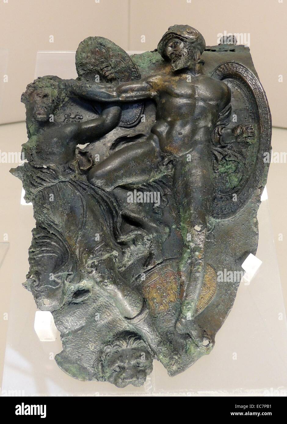 Pair of bronze shoulder straps cuirass decorated with Greeks fighting Amazons. in Taranto 390-340 BC Stock Photo - Alamy