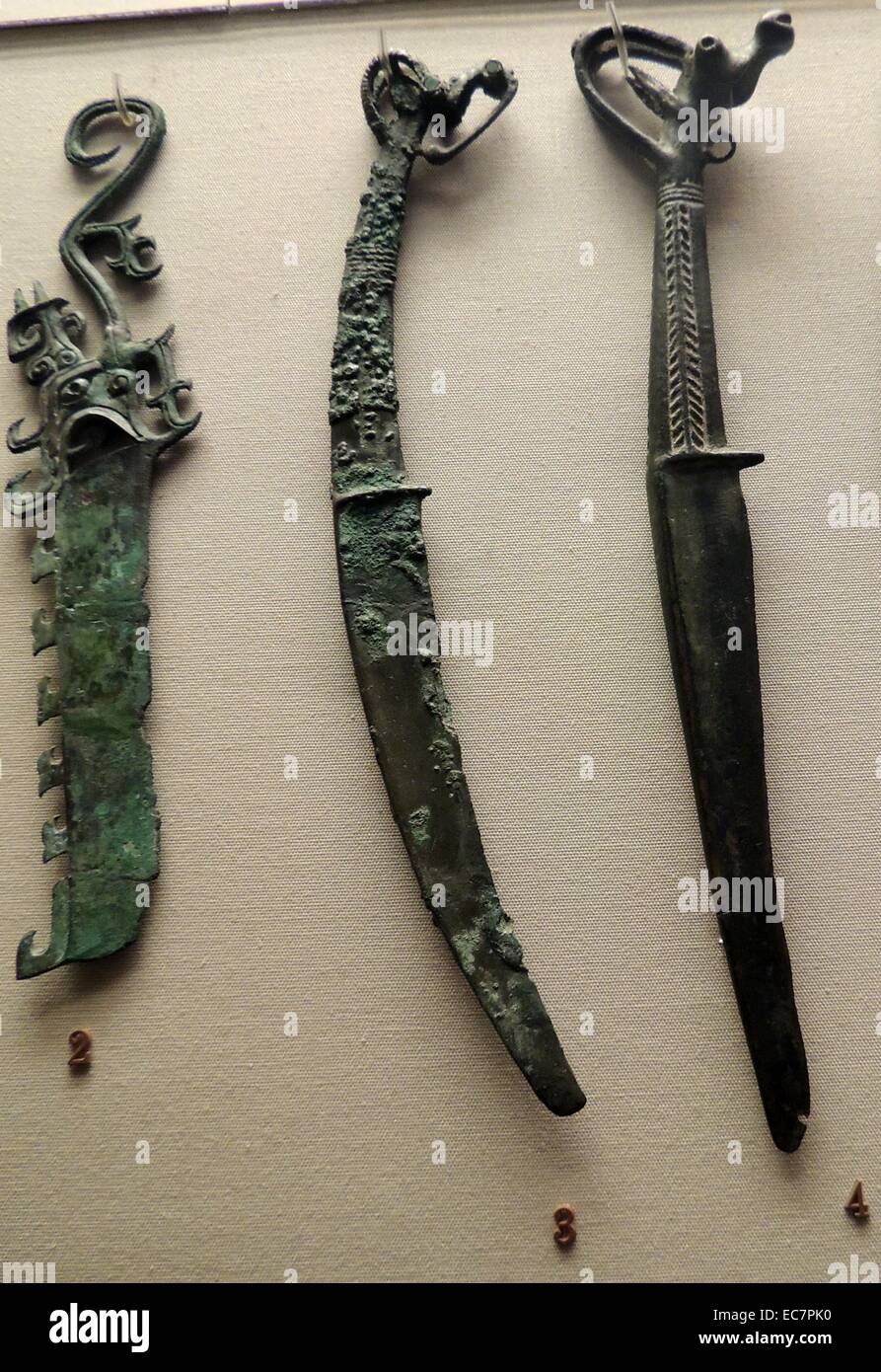https://c8.alamy.com/comp/EC7PK0/bronze-knives-with-various-heads-shang-dynasty-11th-12th-century-EC7PK0.jpg