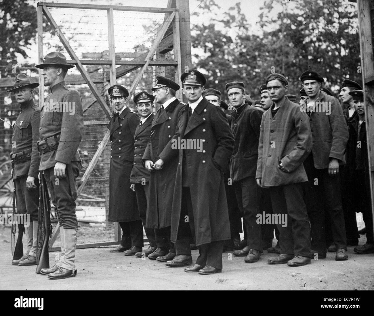 Photograph of the captured German officers and crew members of the U-58 submarine upon their entry into a POW camp at Fort McPherson, Georgia. Dated 1918 Stock Photo