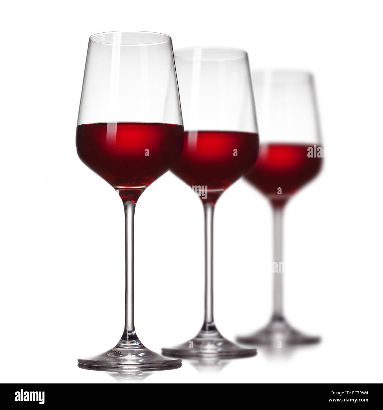 Red wine in glasses isolated on white Stock Photo