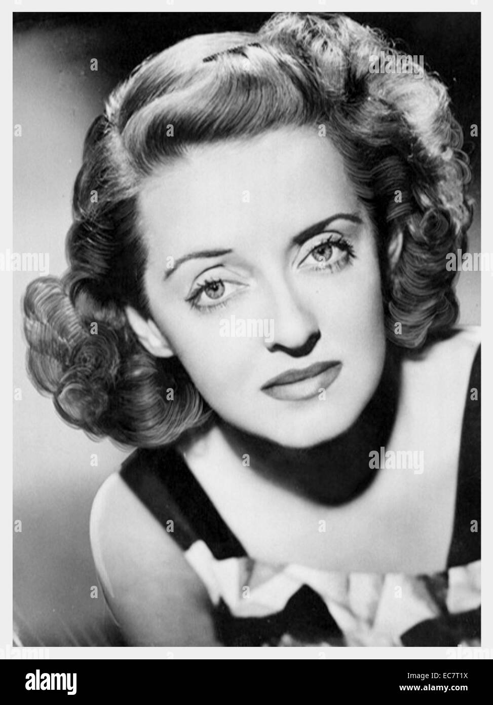 Bette Davis (1908-1989) - also know as The First Lady of American Cinema - was an American film, television and theatre actress. Notable because of her willingness to play sardonic and unsympathetic characters she pioneered equal pay for women in the film Stock Photo