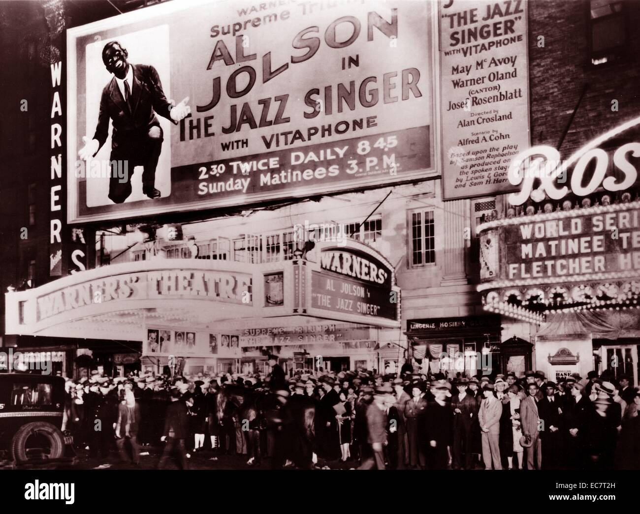 Premiere of The Jazz Singer. The Jazz Singer is a 1927 American musical film. The first feature-length motion picture with synchronized dialogue sequences, its release heralded the commercial ascendance of the 'talkies' and the decline of the silent film era. Directed by Alan Crosland, the movie stars Al Jolson, who performs six songs. The film is based on The Day of Atonement, a play by Samson Raphaelson. Stock Photo