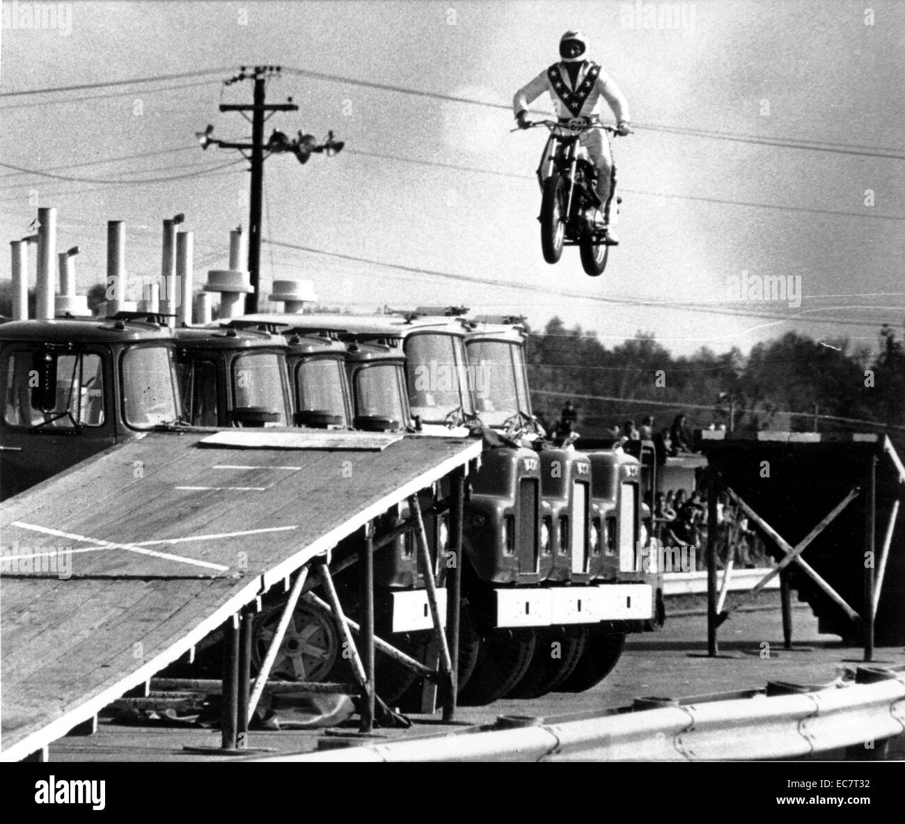Evel Knievel was an American daredevil, painter, entertainer, and international icon. In his career he attempted over 75 ramp-to-ramp motorcycle jumps between 1965 and 1980, and in 1974, a failed jump across Snake River Canyon in the Skycycle X-2, a steam-powered rocket. The over 433 broken bones he suffered during his career earned him an entry in the Guinness Book of World Records as the survivor of 'most bones broken in a lifetime' Stock Photo