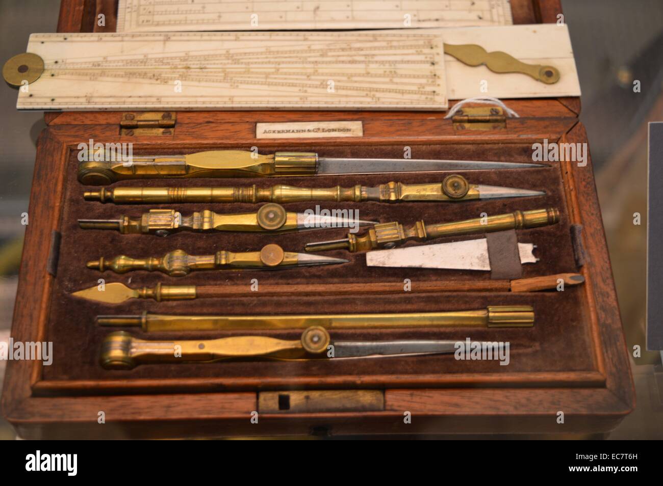 A standard drawing set.  By the 19th century sets of drawing instruments ranged from huge magazine cases  filled with every conceivable device to more modest options. This case contains a pen and dividers, as well as compasses with extensions and alternative drawing points.  There is also a scale rule, parallel ruler and sector, all in ivory. Stock Photo