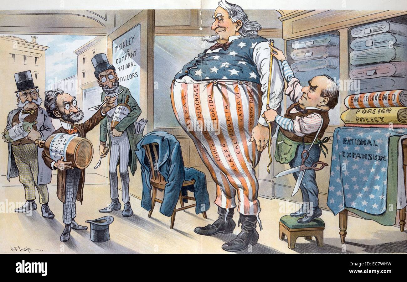 Declined with thanks' A huge Uncle Sam getting a new outfit made at the 'McKinley and Company National Tailors' with President McKinley taking the measurements. Carl Schurz, Joseph Pulitzer, and Oswald Ottendorfer stand inside the entrance to the shop and Schurz is offering Uncle Sam a spoonful of 'Anti-Expansion Policy' medicine, a bottle of which each is carrying. On the right are bolts of cloth labelled 'Enlightened Foreign Policy' and 'Rational Expansion.' The strips on Uncle Sam's trousers are labelled 'Texas, Louisiana Purchase, Alaska, Florida, California, Hawaii, [and] Porto Rico.' Stock Photo