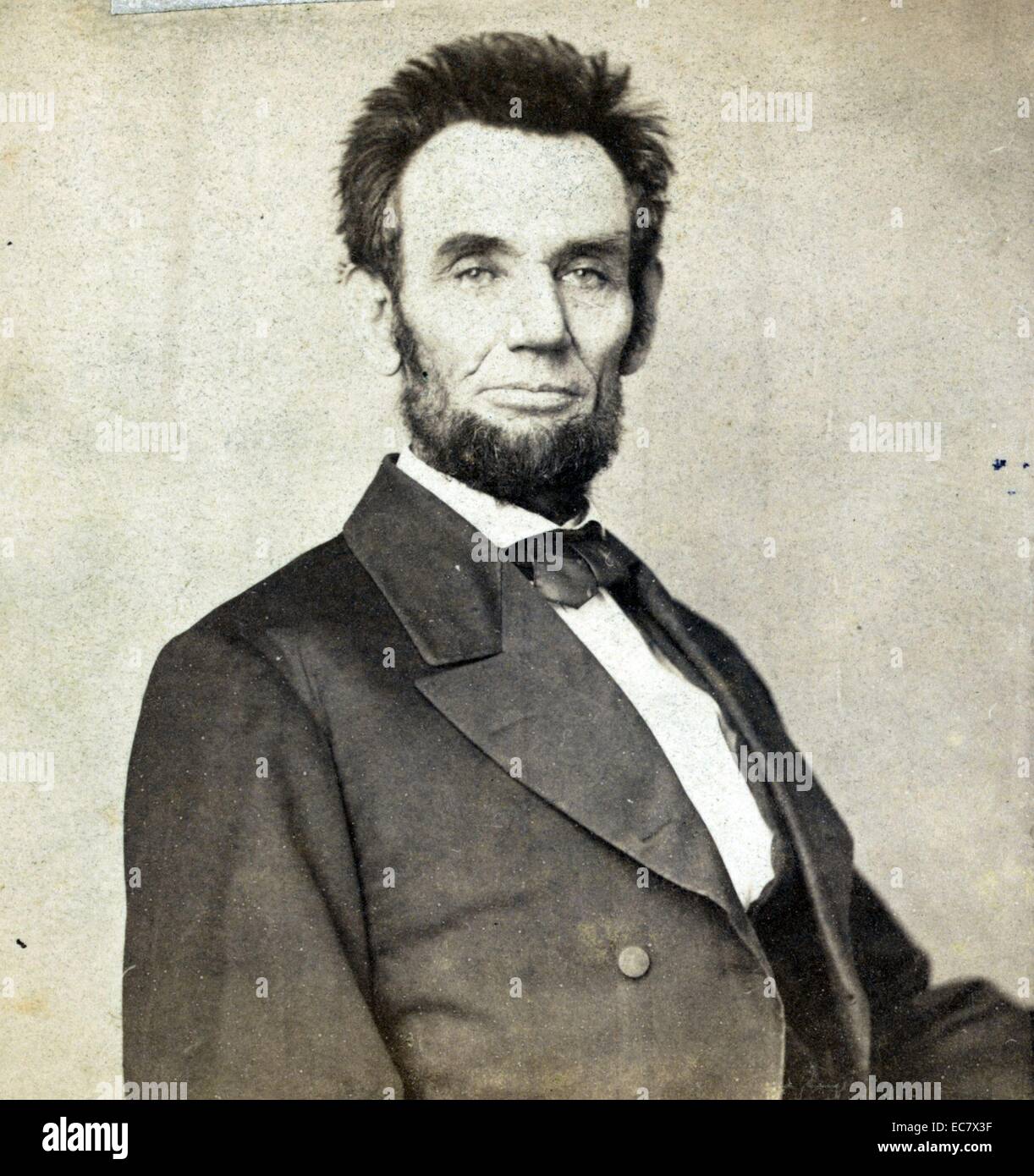 Abraham Lincoln, President of the United States. The short haircut was perhaps suggested by Lincoln's barber to facilitate the taking of his life mask by Clark Mills. Lincoln knew from experience how long hair could cling to plaster. Stock Photo