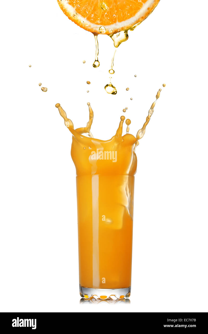 fresh orange juice splash in the glass isolated on white Stock Photo ...