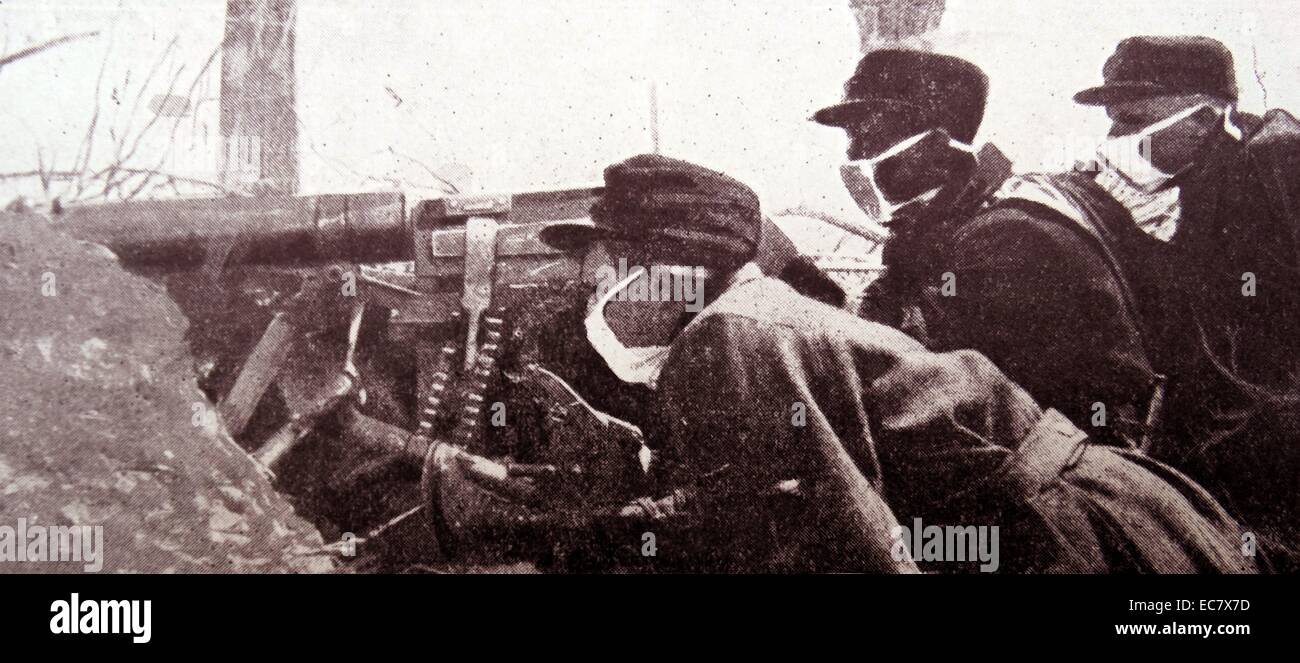 World war One gas attack on Belgian artillery soldiers wearing masks. 1914 Stock Photo