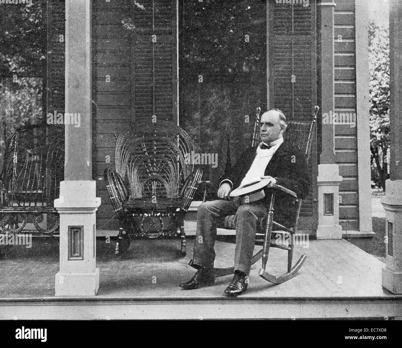 President William McKinley on the porch of his Canton home. McKinley (1843-1901)was the 25th President of the United States and led the nation to victory in the Spanish–American War, raised protective tariffs to promote American industry, and maintained the nation on the gold standard in a rejection of inflationary proposals. Stock Photo