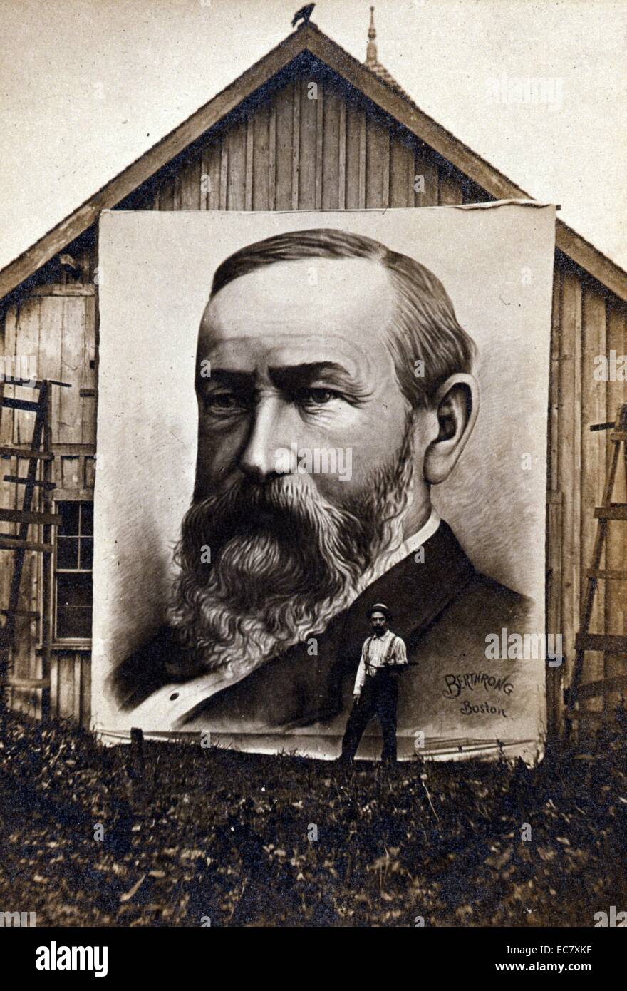 Painting of President Benjamin Harrison displayed on the side of a barn with the artist standing next to it. The artist signed the portrait 'Berthrong Boston.' Stock Photo