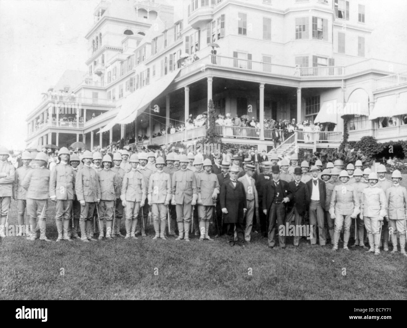President McKinley and officers of 26th U.S.V. Infantry in front of Hotel Champlain, [Plattsburg, N.Y.]' McKinley (1843-1901)was the 25th President of the United States and led the nation to victory in the Spanish–American War, raised protective tariffs to promote American industry, and maintained the nation on the gold standard in a rejection of inflationary proposals. Stock Photo