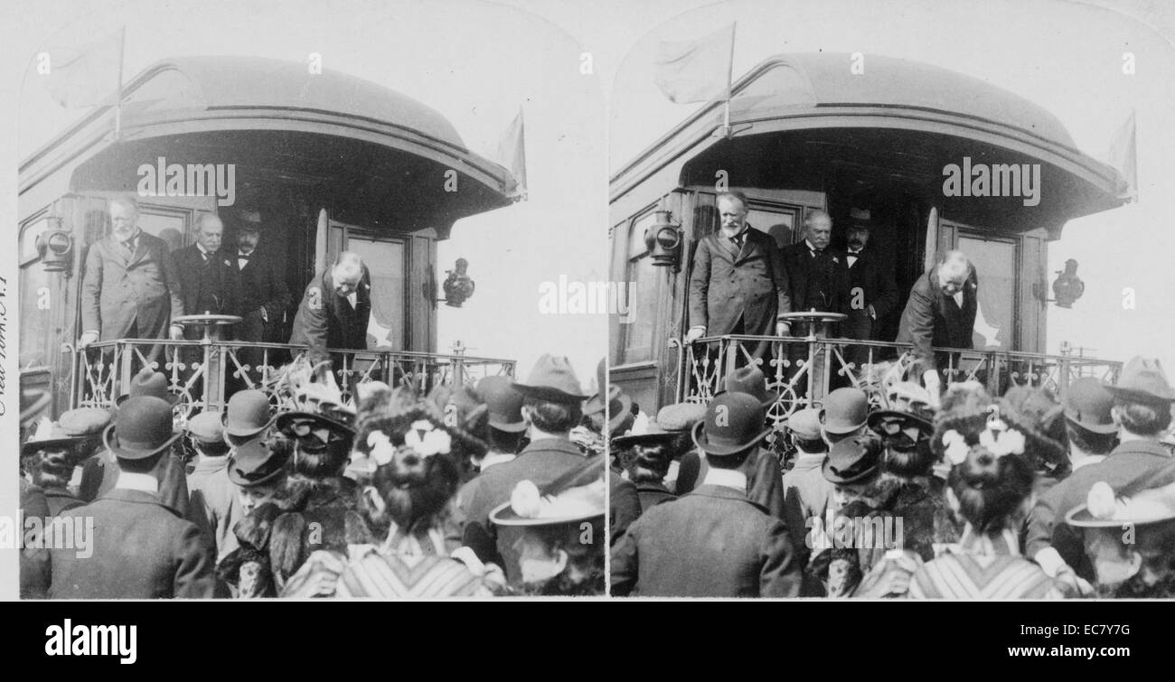 The President shaking hands from rear platform; Sec. Wilson, Sec. Hitchcock and Sec. Cortelyou with him--Alliance, Ohio. McKinley (1843-1901)was the 25th President of the United States and led the nation to victory in the Spanish–American War, raised protective tariffs to promote American industry, and maintained the nation on the gold standard in a rejection of inflationary proposals. Stock Photo