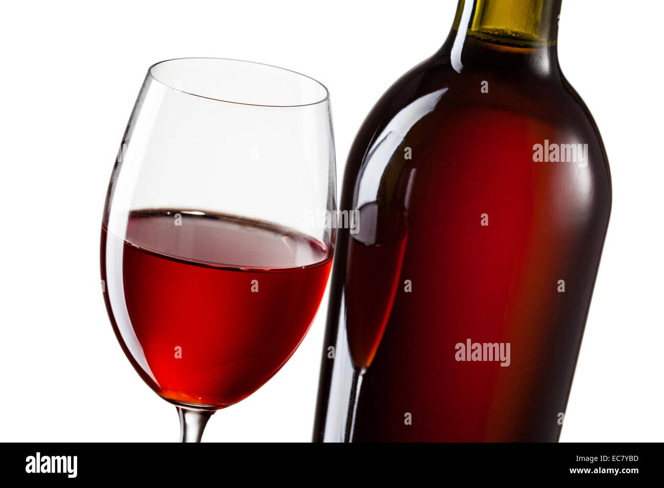 Glass of red wine and bottle isolated on white Stock Photo - Alamy