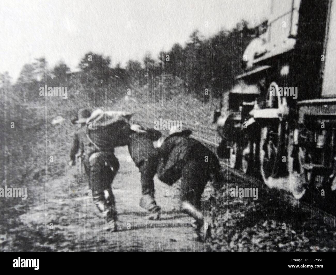 The robbers make their escape into the woods. The Great Train Robbery 1903 Stock Photo