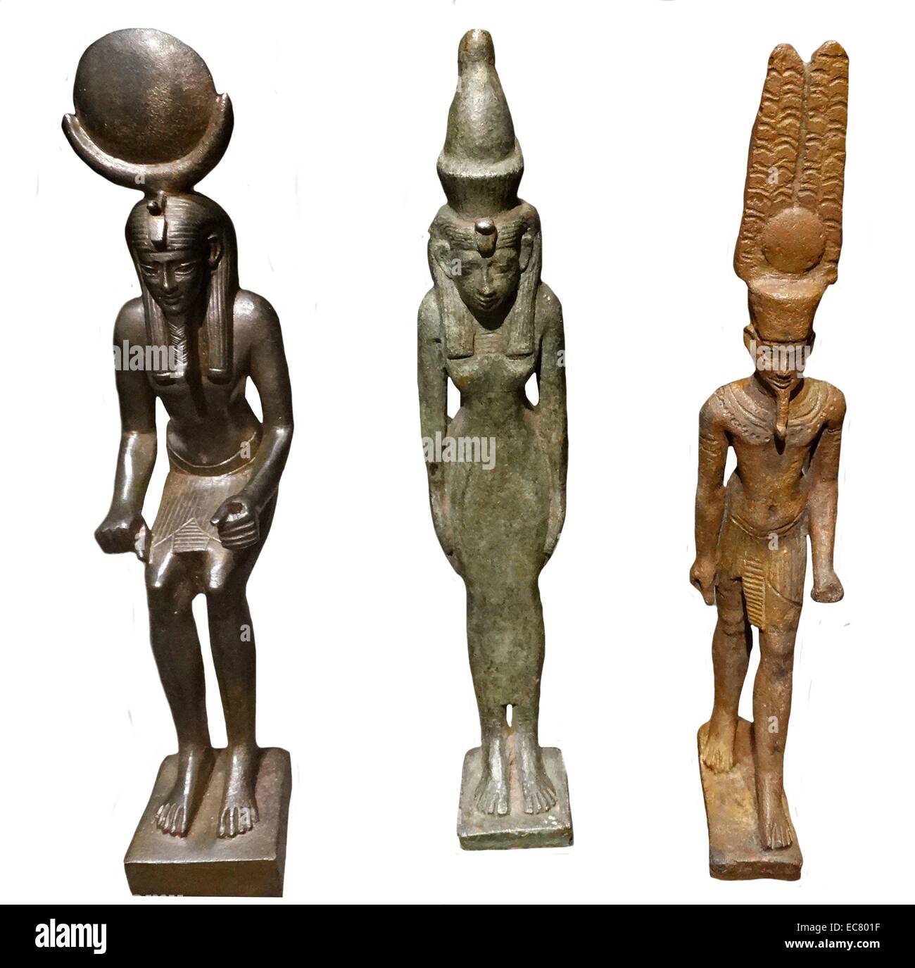 Left to right: Khonsu, Mut and Amun; gods of ancient Egypt. Khonsu was a god whose main role was associated with the moon; Mut, which meant mother in the ancient Egyptian language, was an ancient Egyptian mother goddess with multiple aspects; Amun acquired national importance, expressed in his fusion with the Sun god, Ra, as Amun-Ra. Stock Photo