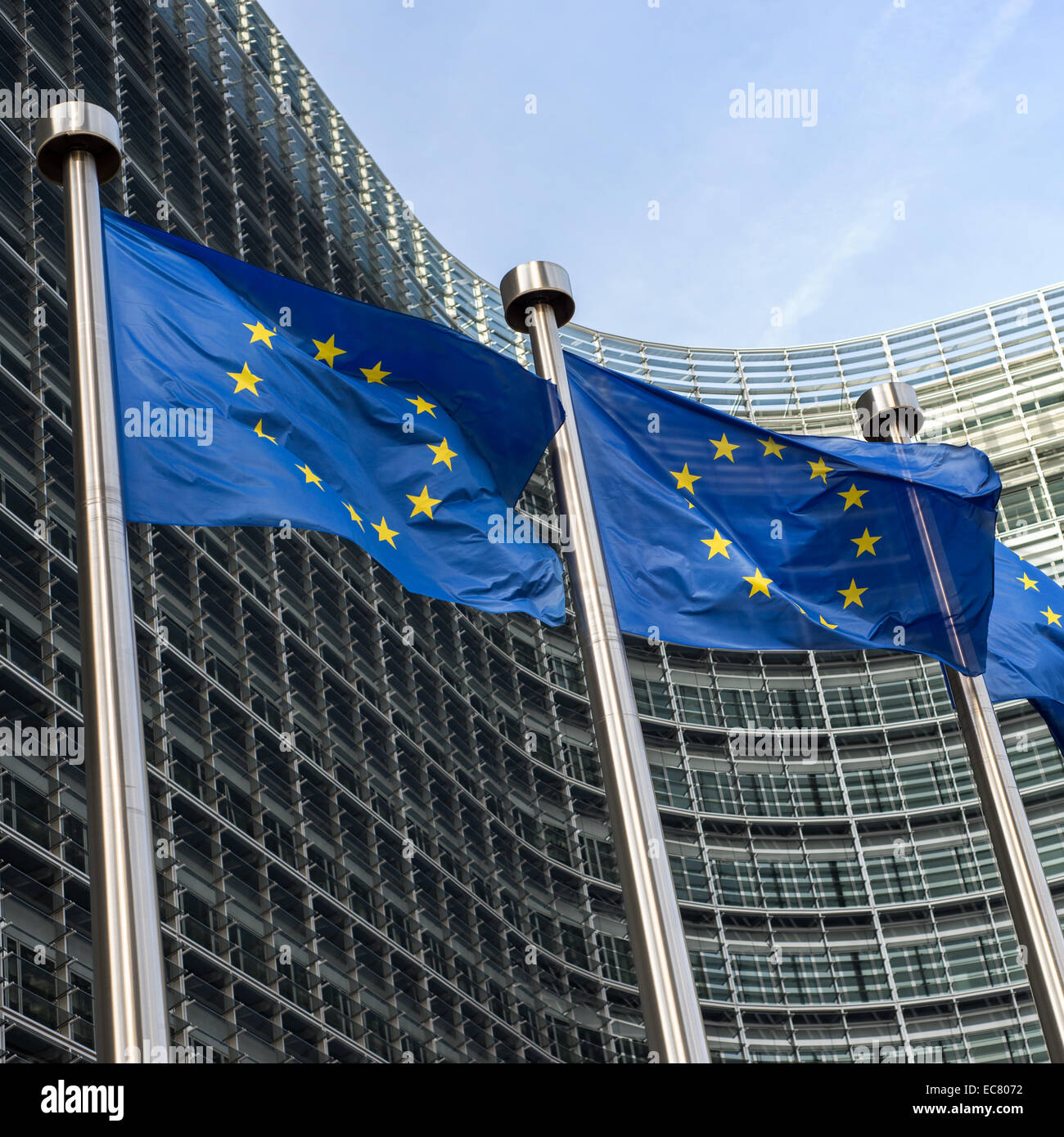 European Union flags in front of the Berlaymont building (European commission) in Brussels, Belgium. Stock Photo