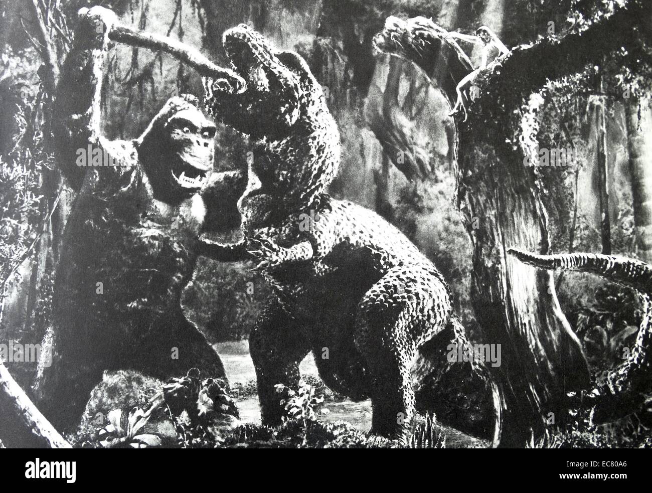 King Kong, 1933.  Brains (plus brawn) vs. brawn.  King Kong defeats a Tyrannosaurus while Fay Wray screams from the treetops. Stock Photo