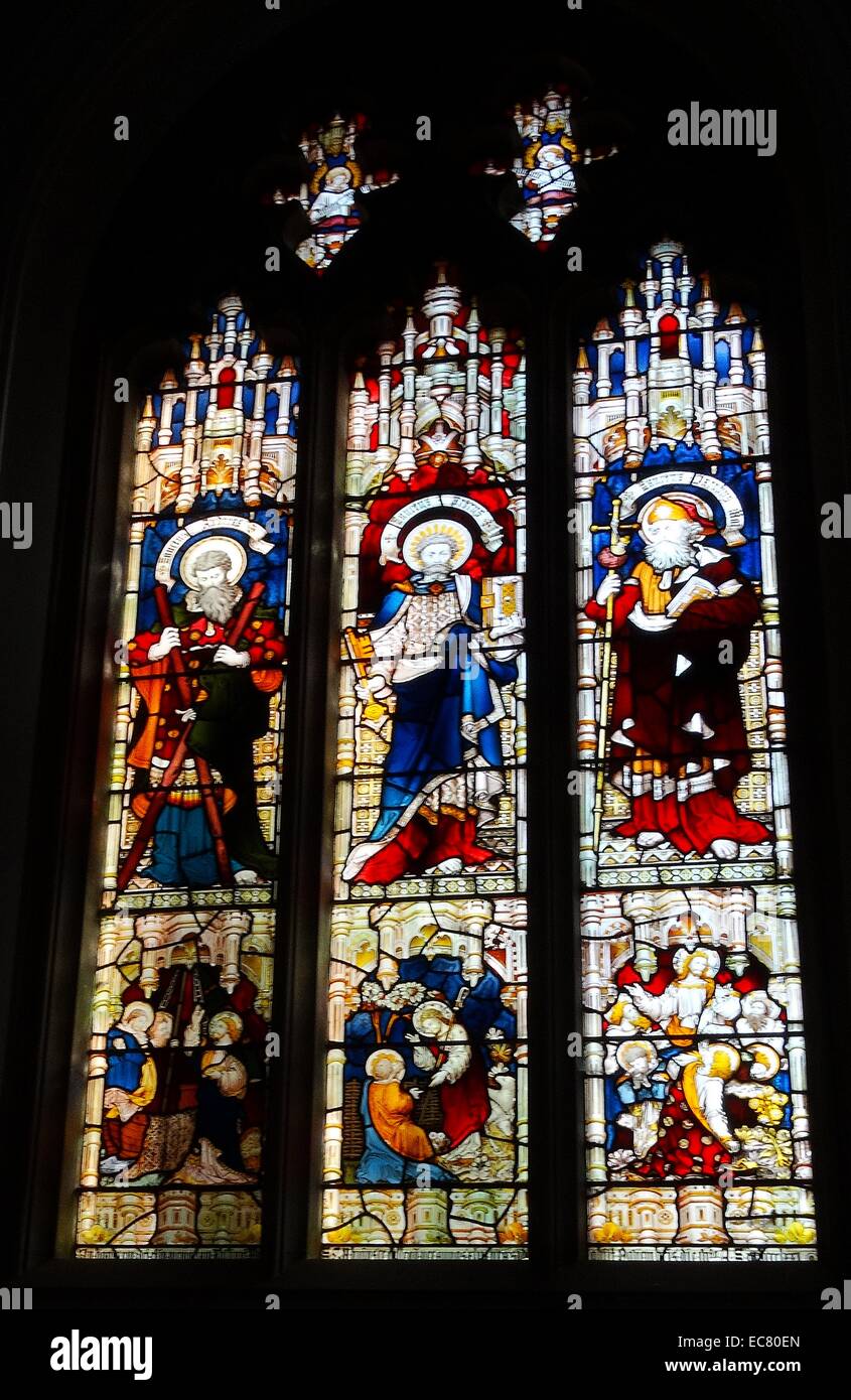 Stained glass window, inside the Chapel of St John's College at the University of Oxford; Oxford; England. Founded in 1555 by the merchant Sir Thomas White, intended to provide a source of educated Roman Catholic clerics to support the Counter-Reformation under Queen Mary. Stock Photo
