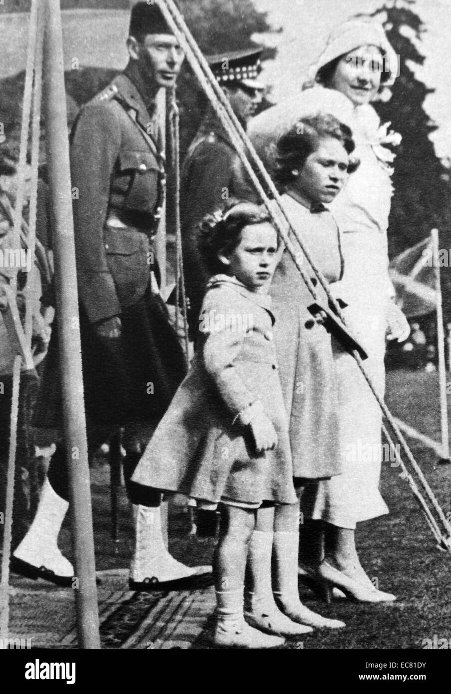 The Duke and Duchess of York (later King George VI and Queen Elizabeth) together with their daughter Princess Elizabeth and Princess Margret at the Highland games at Braemar, Scotland in 1934. Stock Photo