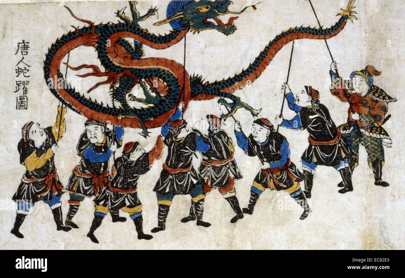 Japanese hand coloured woodcut. This print shows eight men holding up a dragon decoration, performing the 'Dragon Dance'. Created between 1850 and 1875. Stock Photo