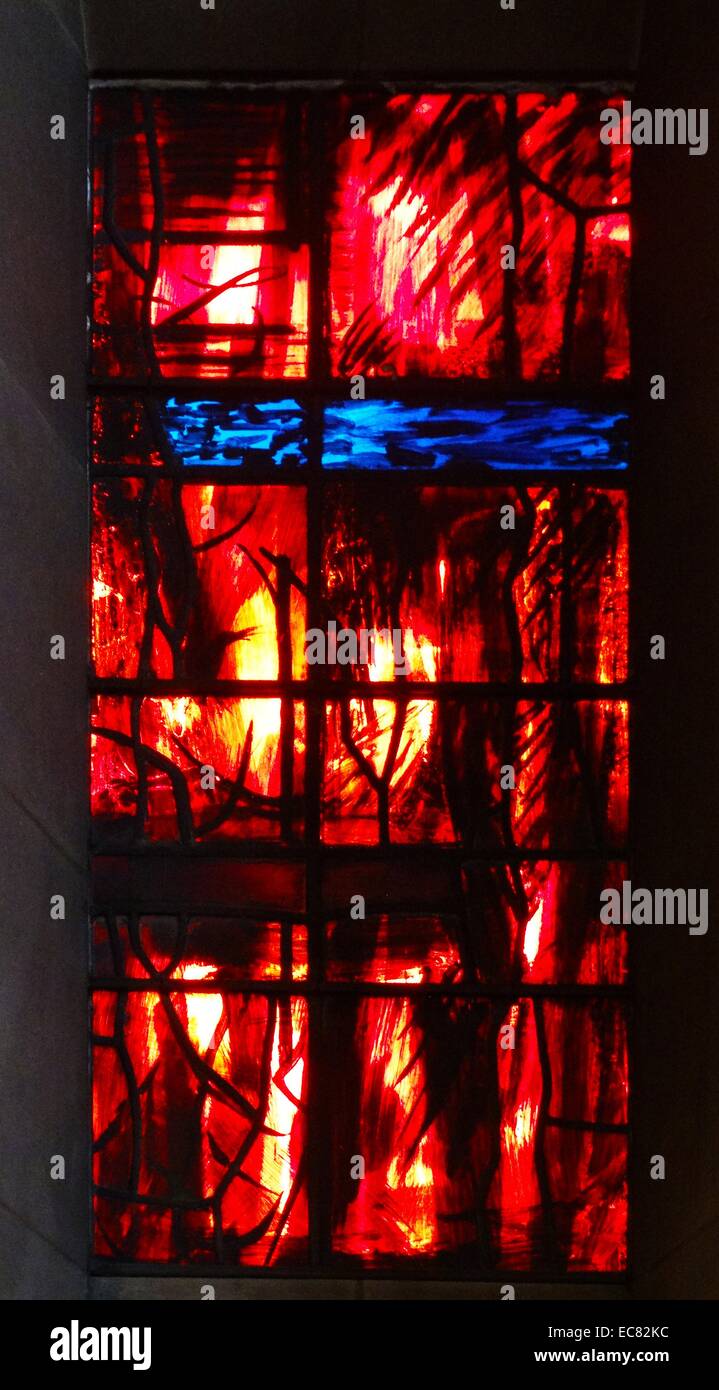 stained glass windows designed by john Piper depict the light of god