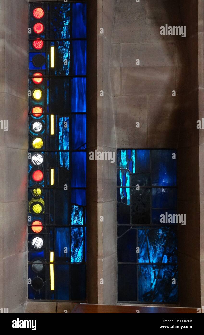 stained glass windows designed by john Piper depict the light of god