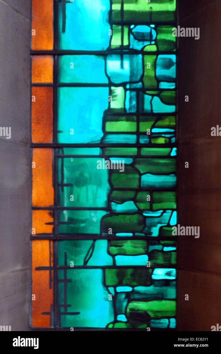 stained glass windows designed by john Piper depict the light of god