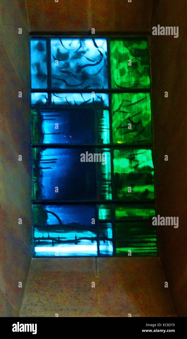 stained glass windows designed by john Piper depict the light of god