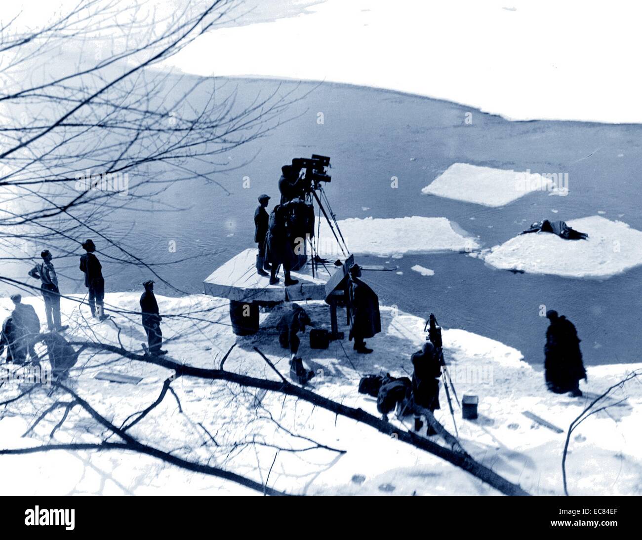 Photograph of Mr D. W. Griffith (1875-1948) filming 'Way Down East' staring Lillian Gish (1893-1993). Whilst filiming this scene Gish's hand and her hair froze. Dated 1920 Stock Photo