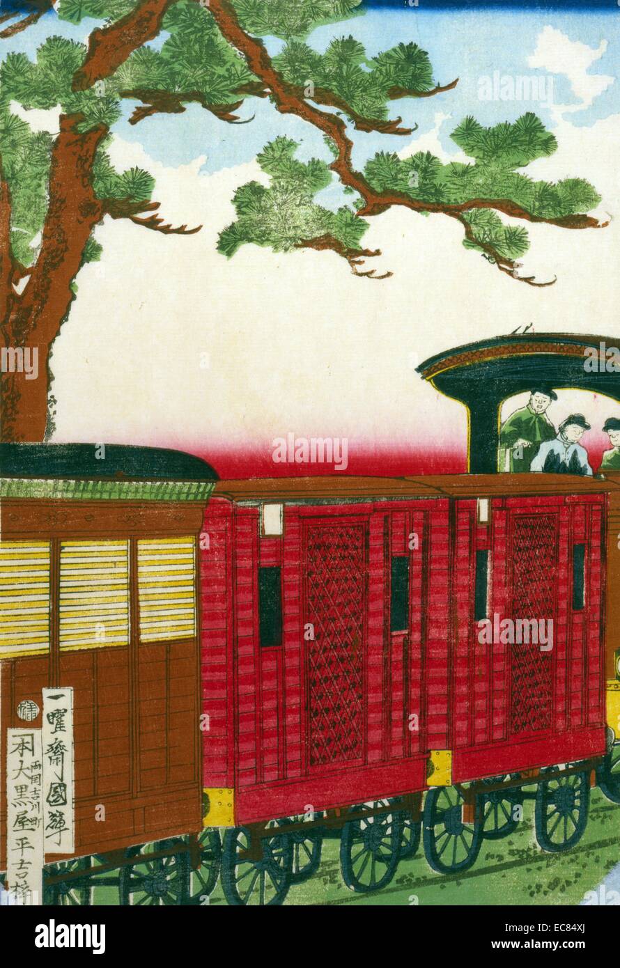 Japanese hand coloured woodcut. The image shows a steam train pulling its carriages, while passing under a large pine tree. The conductor and his crew can be seen to the right of the image. Dated 1872. Stock Photo