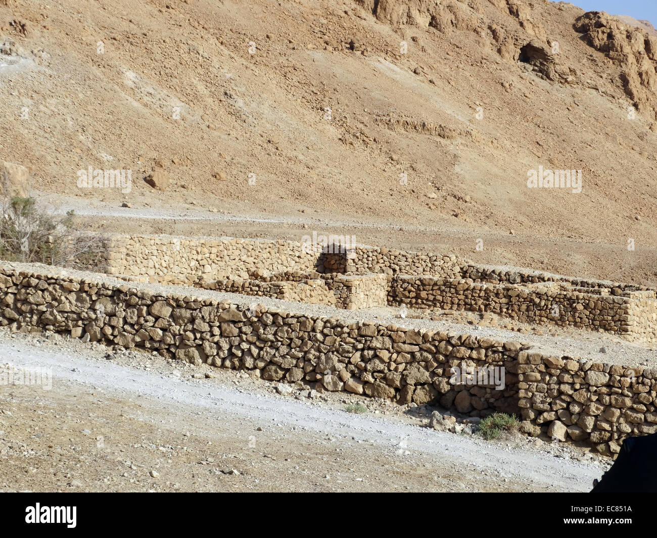 Ruins of a Roman siege fort located at the base of Masada; in the Southern Israel. According to Josephus; the Siege of Masada by troops of the Roman Empire towards the end of the First Jewish–Roman War ended in the mass suicide of rebels Stock Photo