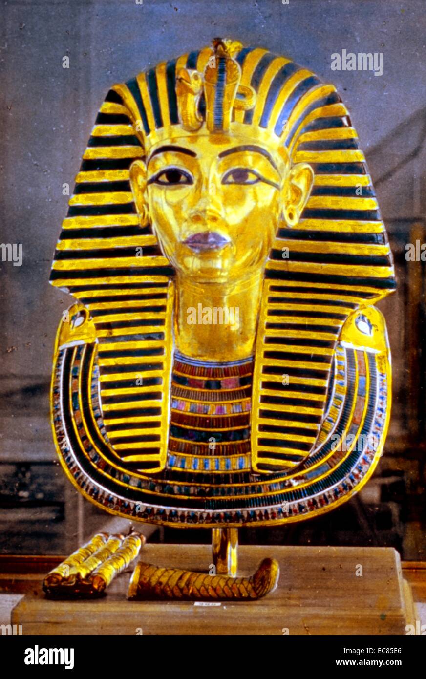 Colour photograph of the gold death mask of Tutankhamen; Egyptian pharaoh of the 18th Dynasty. Dated 1930 Stock Photo