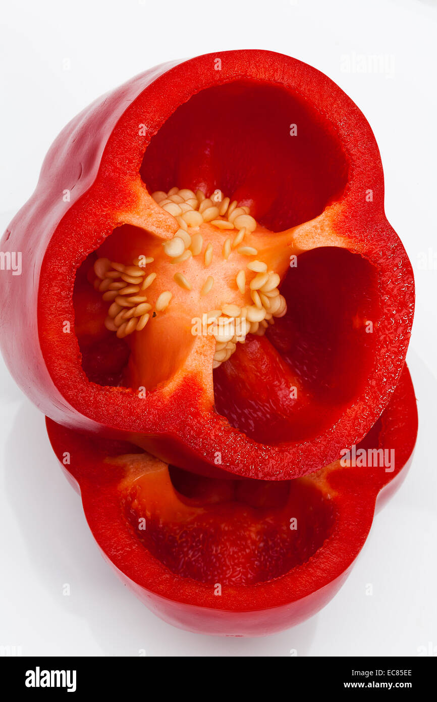 Halved red bell pepper closeup. Stock Photo