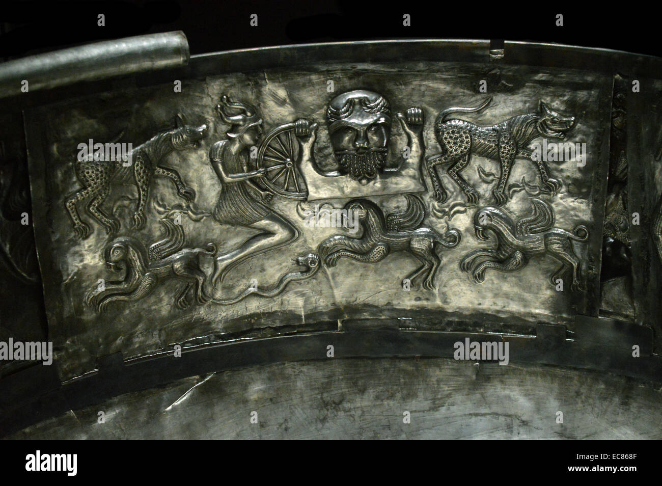 The Gundestrup cauldron is a richly decorated silver vessel; thought to date between 200 BC and 300 AD; placing it within the late La Tène period or early Roman Iron Age. The cauldron is the largest known example of European Iron Age silver work. It was found in 1891 in a peat bog near the hamlet of Gundestrup in the Aars parish of Himmerland; Denmark Stock Photo