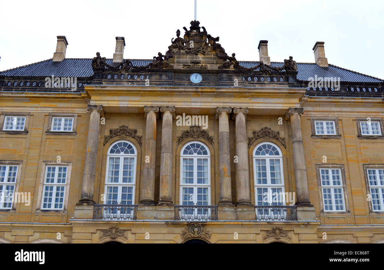 Amalienborg Palace: the winter home of the Danish royal family; in Copenhagen; Denmark. consists of four identical neo-classical palace façades with rococo interiors; around an octagonal courtyard. Amalienborg was originally built for four noble families; however; when Christiansborg Palace burnt down in 1794; the royal family bought the palaces and moved in. Stock Photo