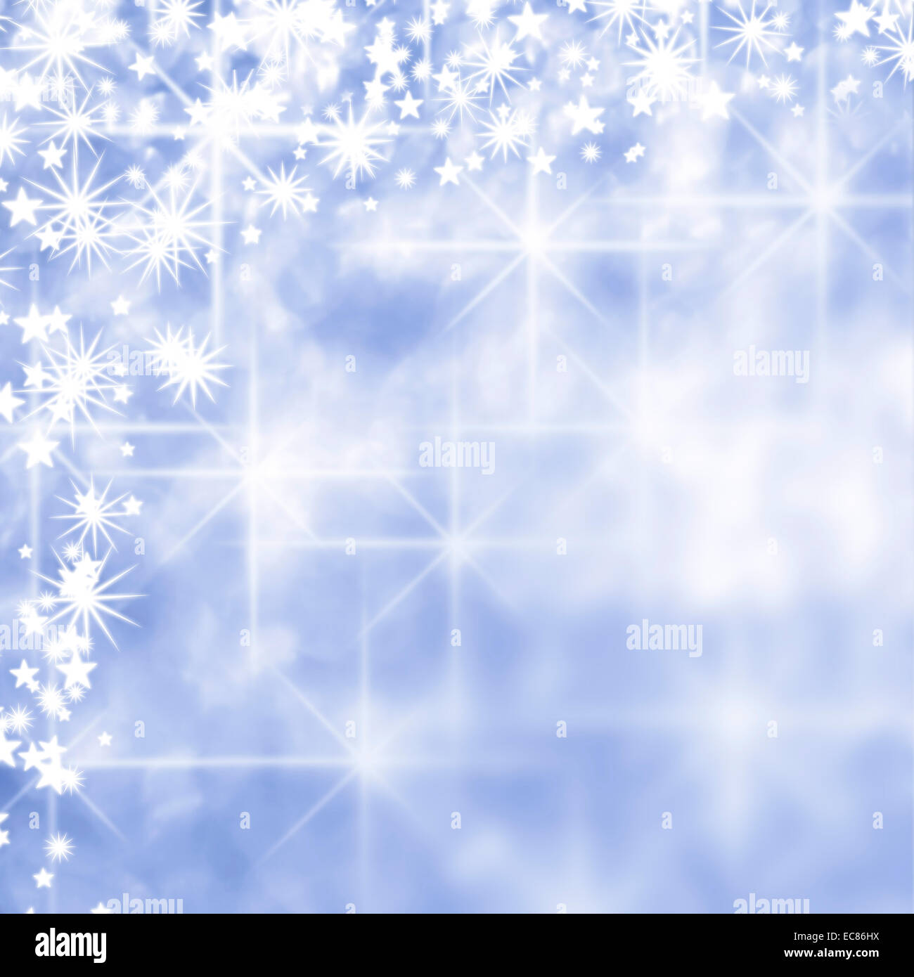 Holiday shiny glowing stars blue background Stock Photo - Alamy