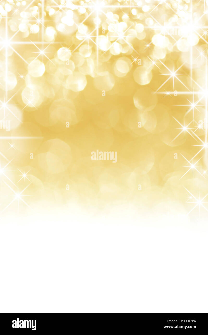 Golden shiny stars christmas bokeh background Stock Photo - Alamy