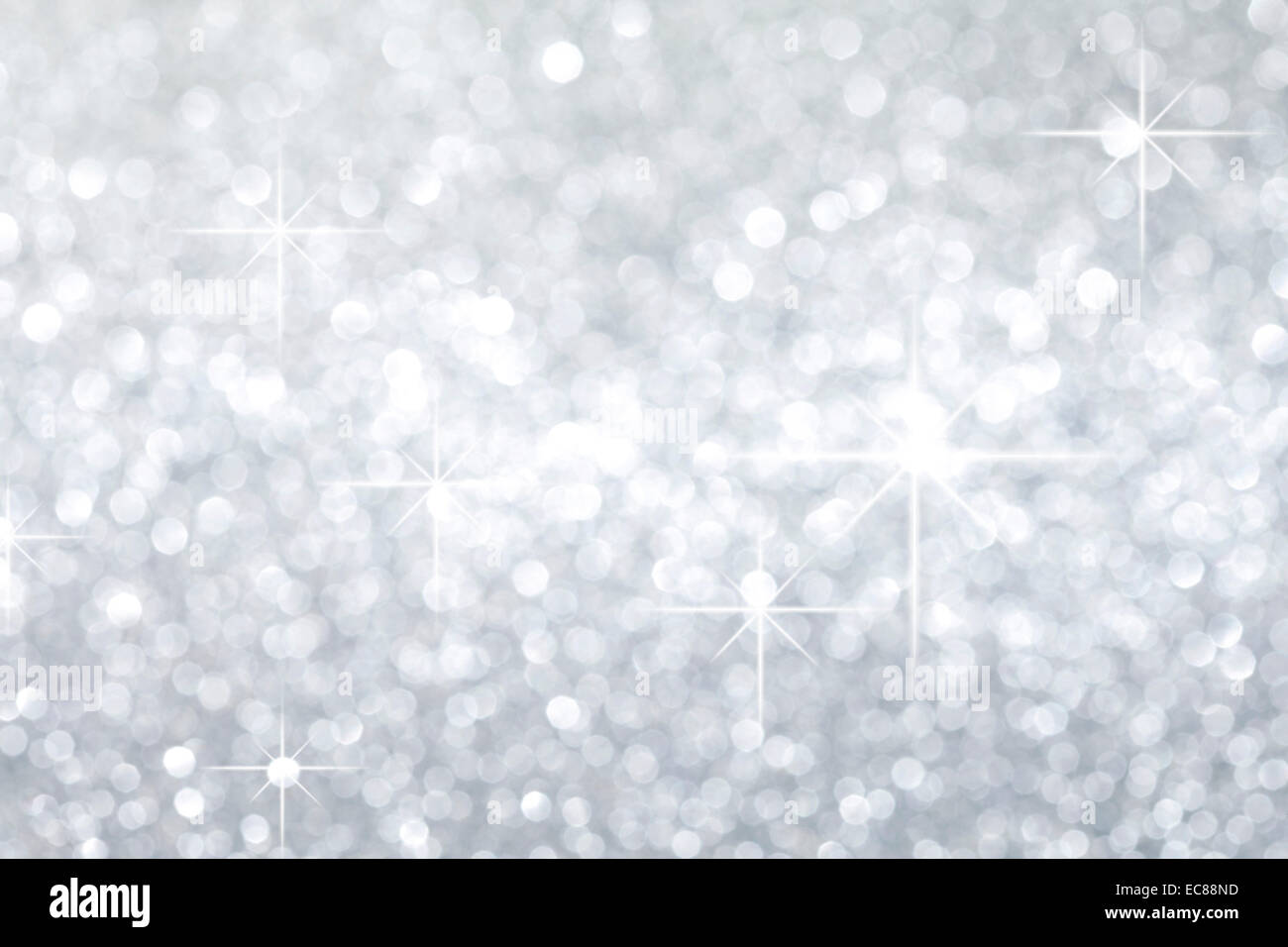 Holiday shiny glowing stars blue background Stock Photo - Alamy