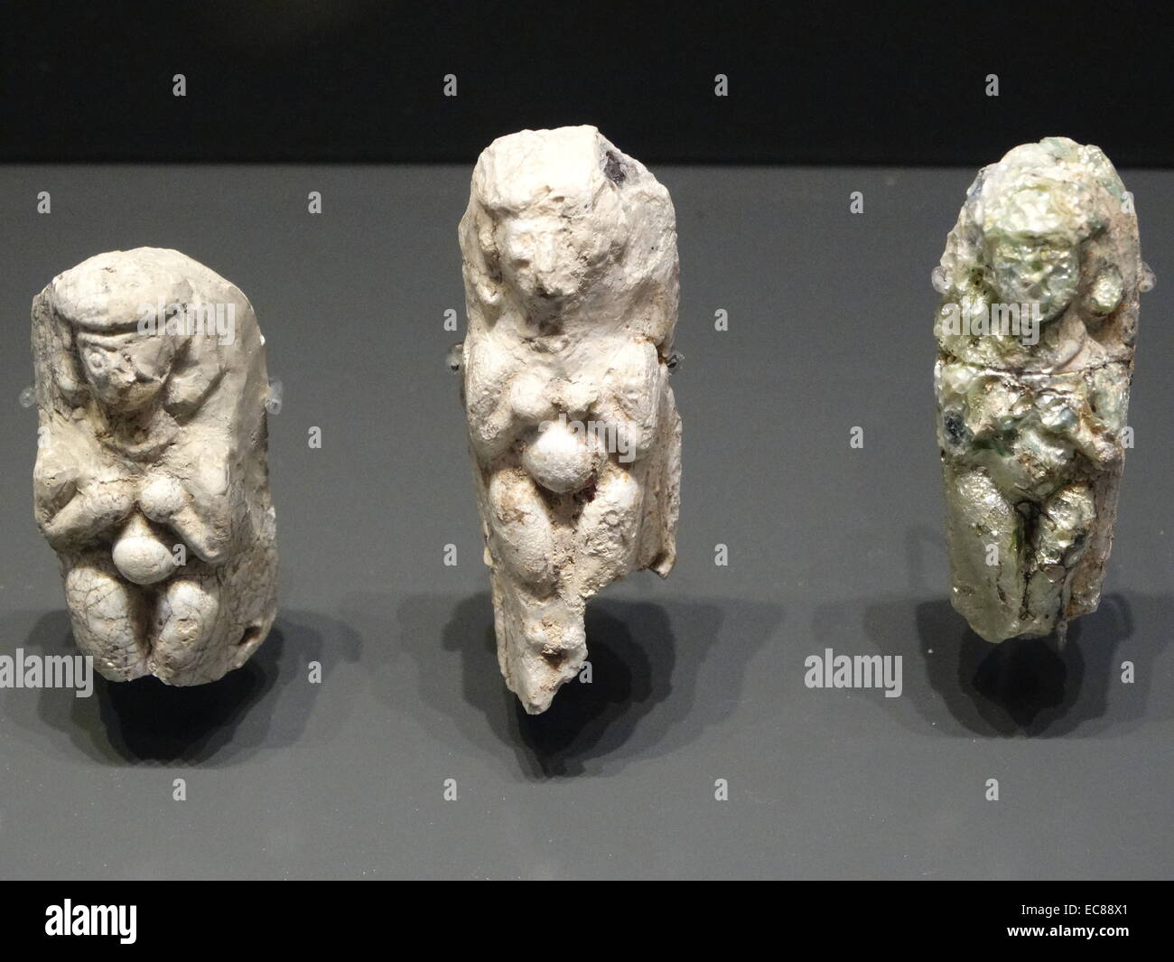 Female figurines dedicated to the goddess of fertility, Astarte. From Beth Shean and Near East, late 16th-13th century, originally brown and blue glass. Stock Photo