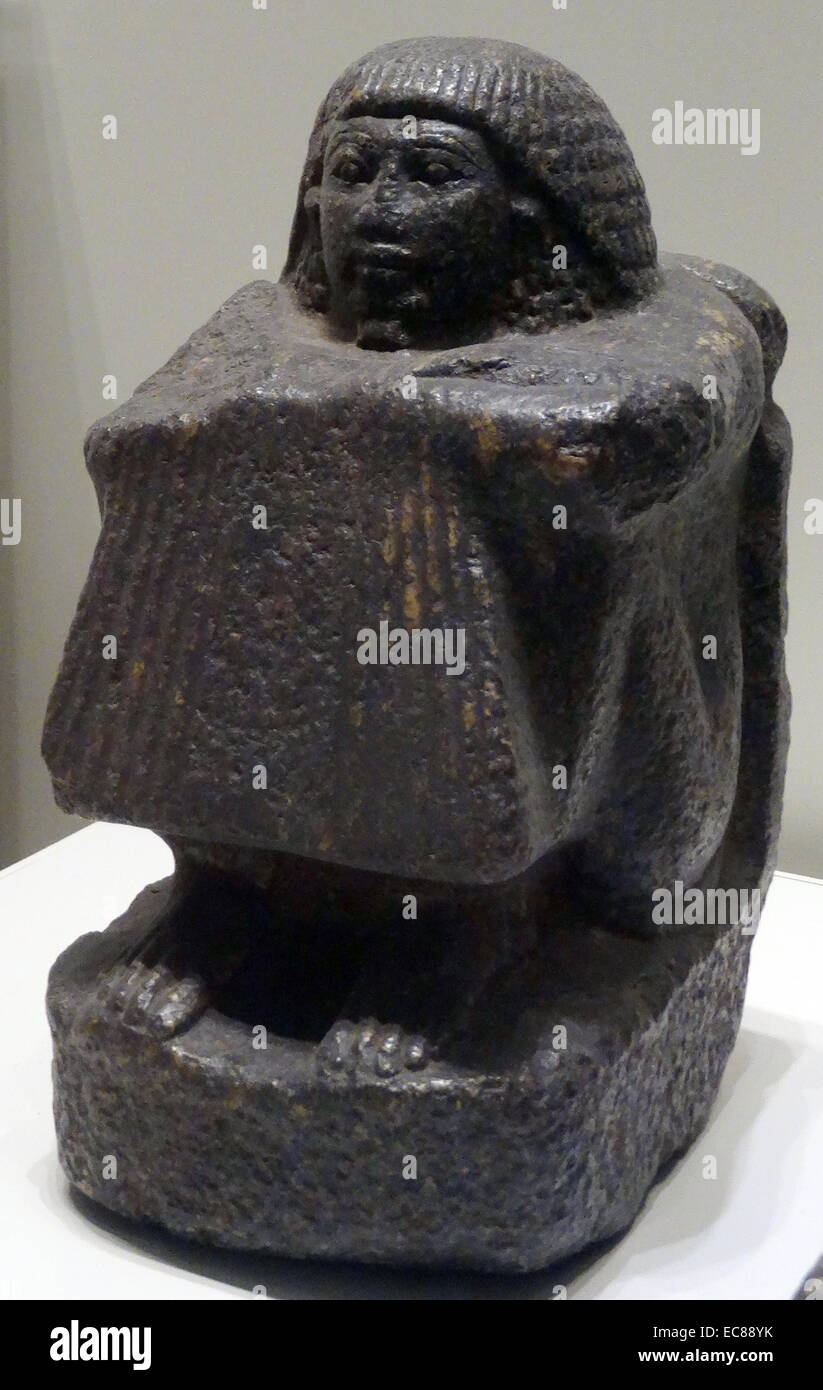 Block statue of an unknown person. From the 13th century BC Stock Photo