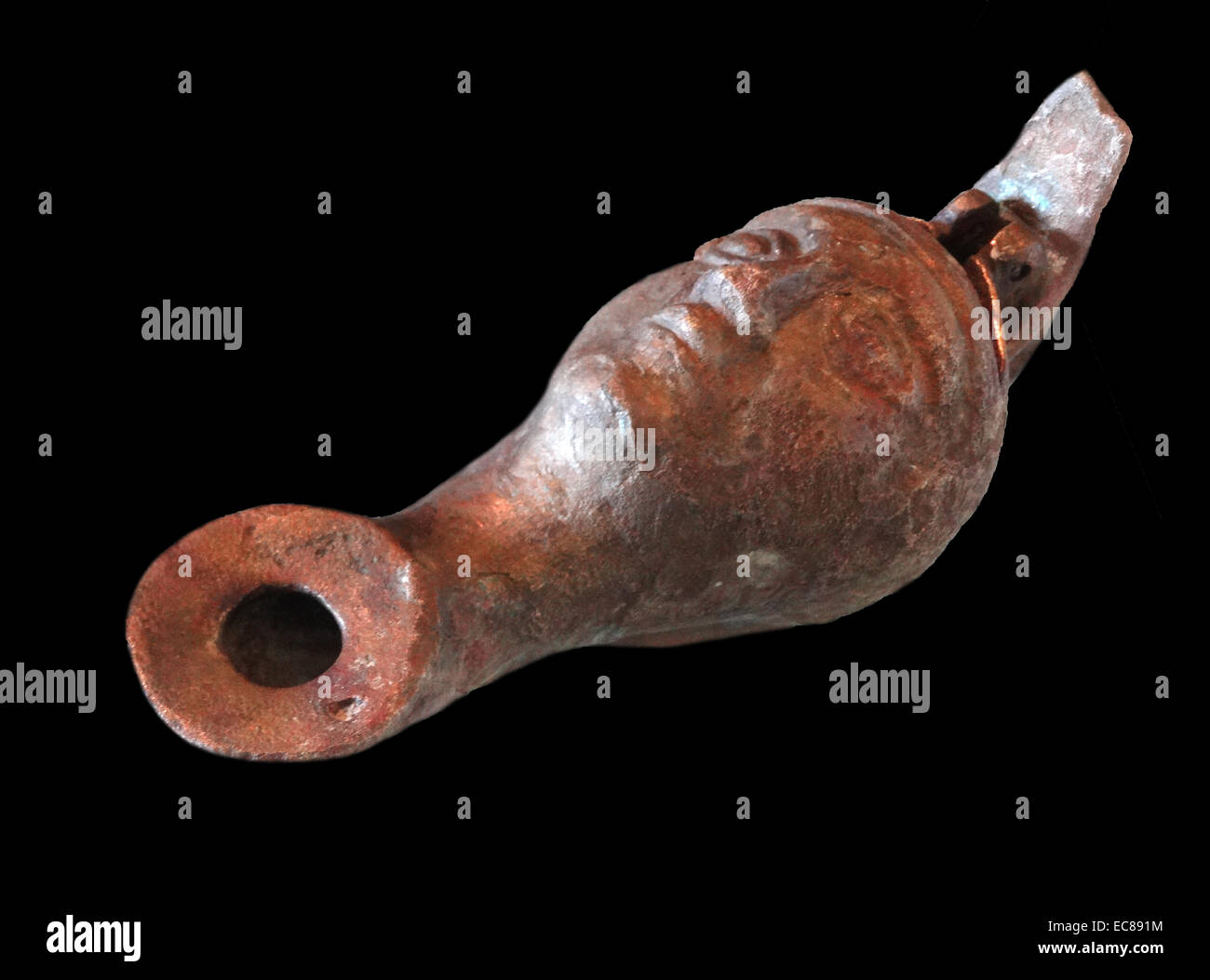 Oil lamp used during the Great Revolt period on Masada. Masada is an ancient fortification in the Southern District of Israel situated on top of an isolated rock plateau on the eastern edge of the Judean Desert, overlooking the Dead Sea Dated 73 BC Stock Photo
